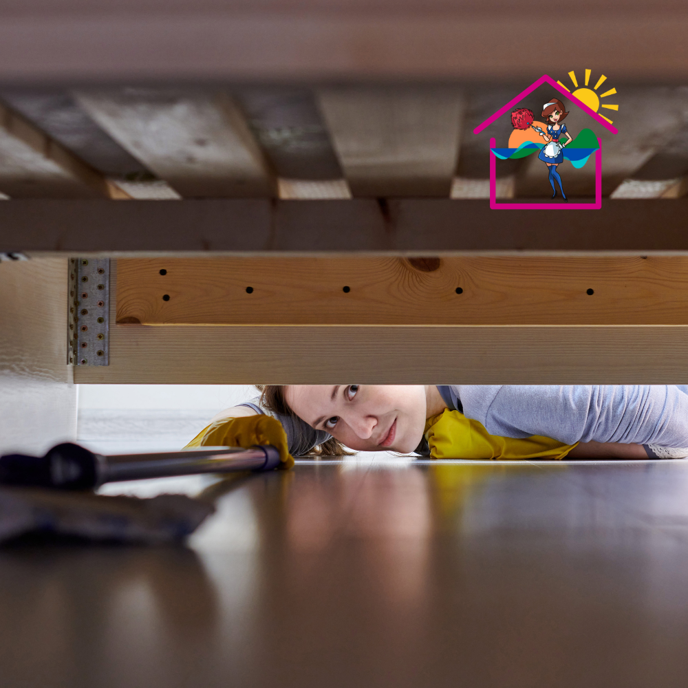 House cleaning Surf coast 12 Women laying down reaching under the bed with deep cleaning equipment