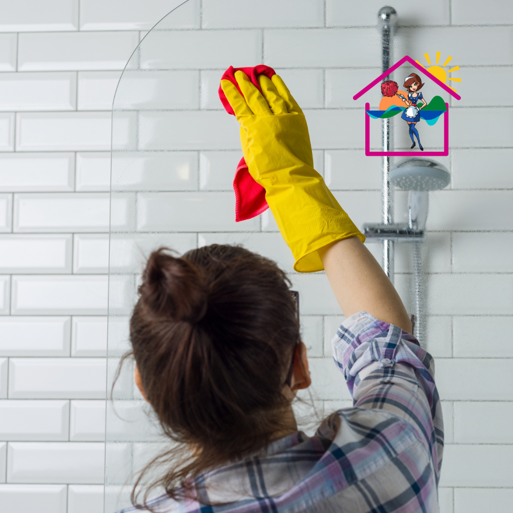 House cleaning Surf coast 10 women gleaning shower glass with gloves on hands and using a cloth