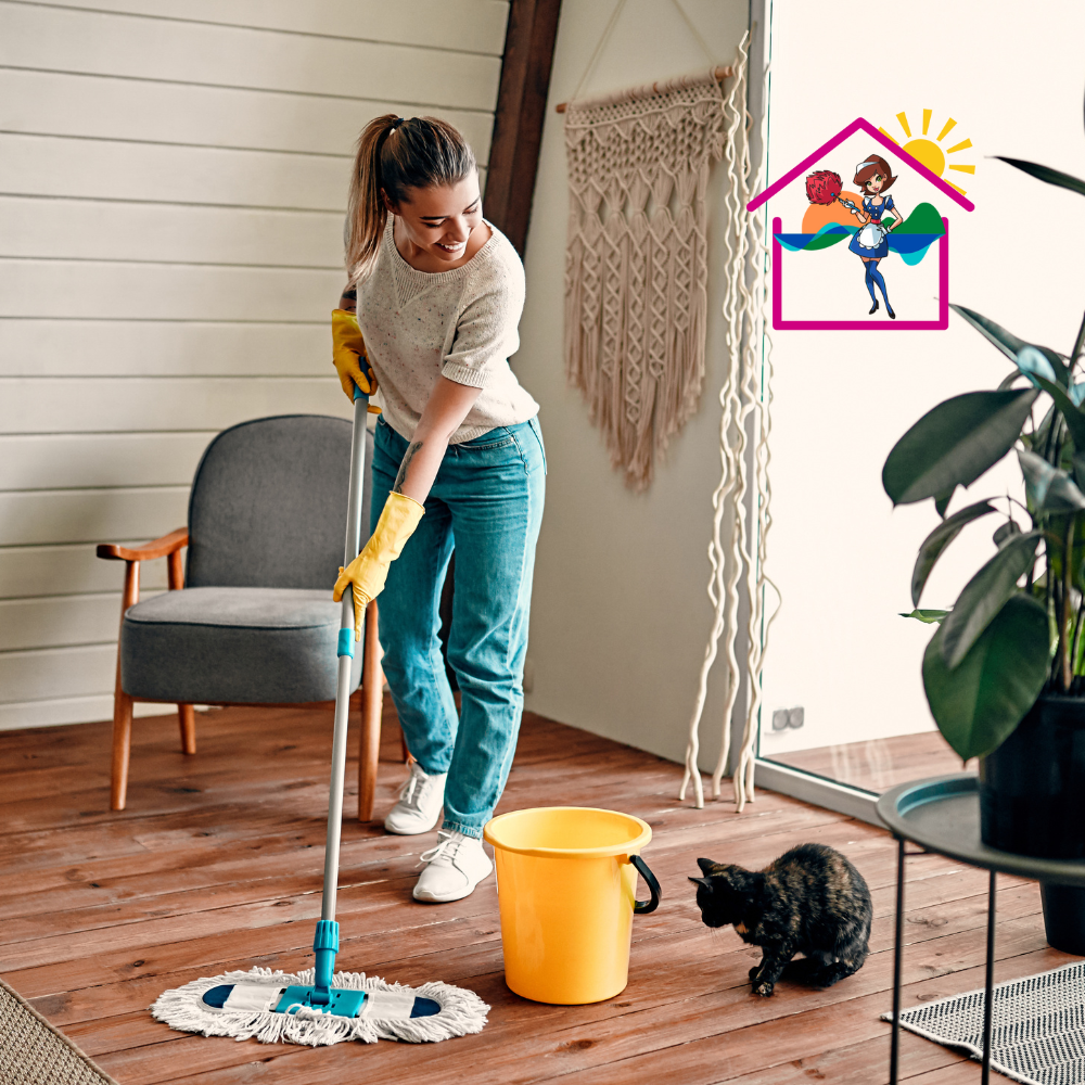House cleaning Surf coast 7 happ women smiling at cat looking up at her while she mops the surf coast house